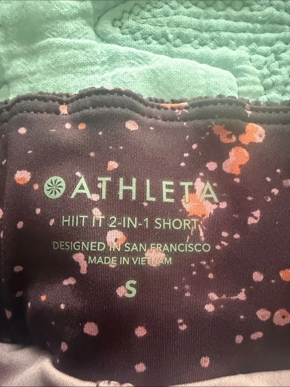 Athleta Dark Plum Shorts with Pink and Coral Speckle